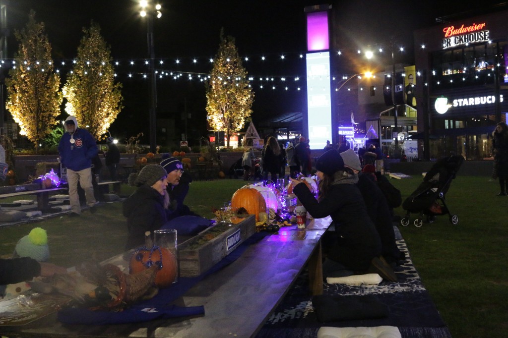String lights and illuminated trees above the plaza during the Bud Light Friendsgiving gathering