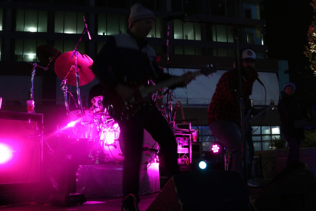 Harvest table styling with gourds and branded touches along the outdoor dining setup