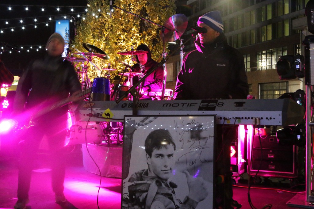 Sponsor signage and plaza lighting along Gallagher Way during the Friendsgiving activation