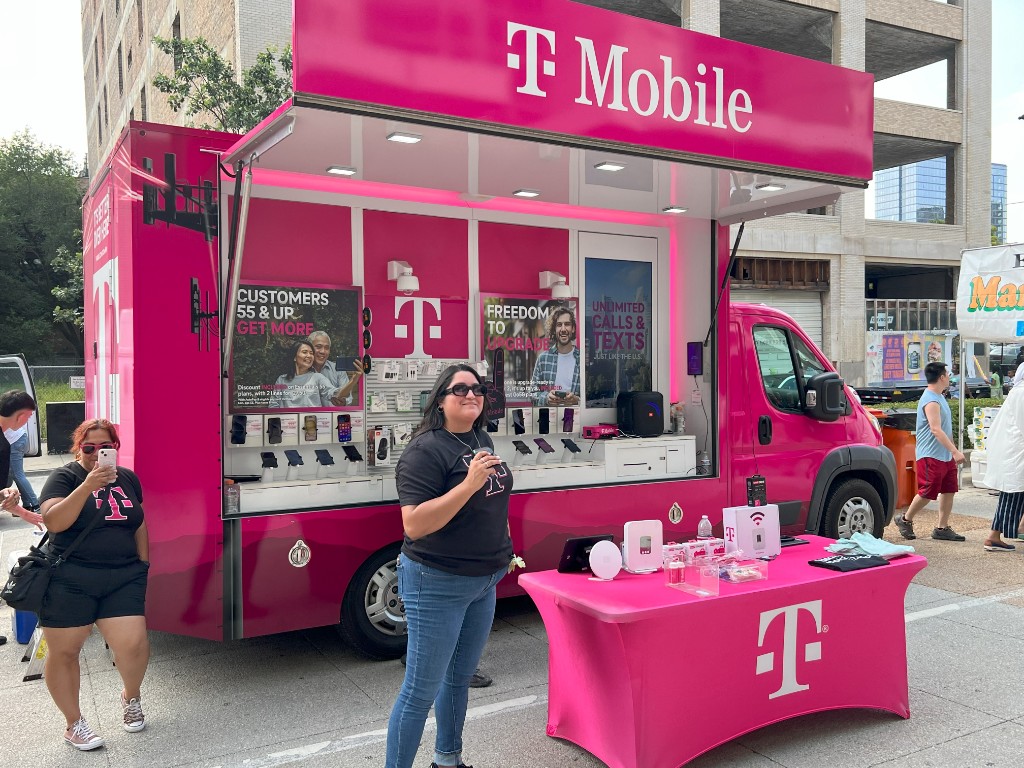 Street festival scene with sponsor activation at Chicago Food Truck Festival